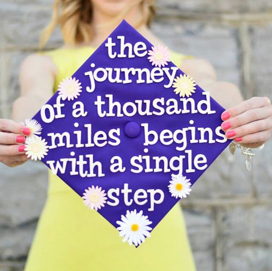 "the journey of a thousand miles begins with a single step" with daisies